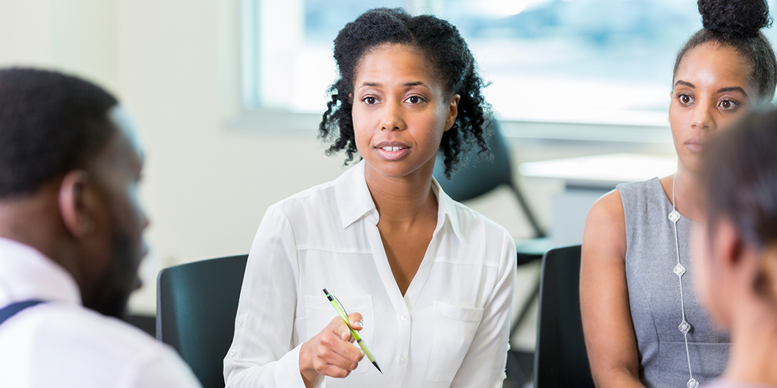 Woman talking to a group